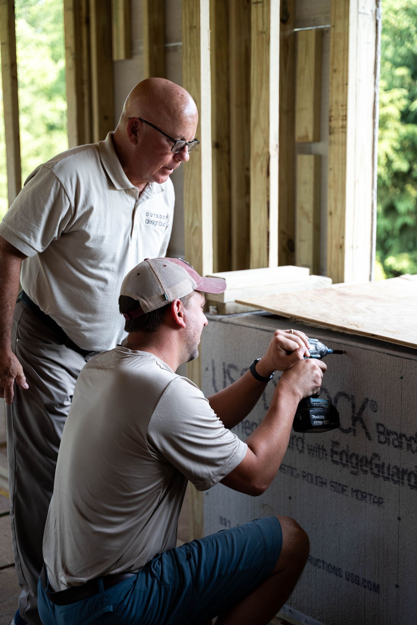 Outdoor Design Build crew members at work on a project
