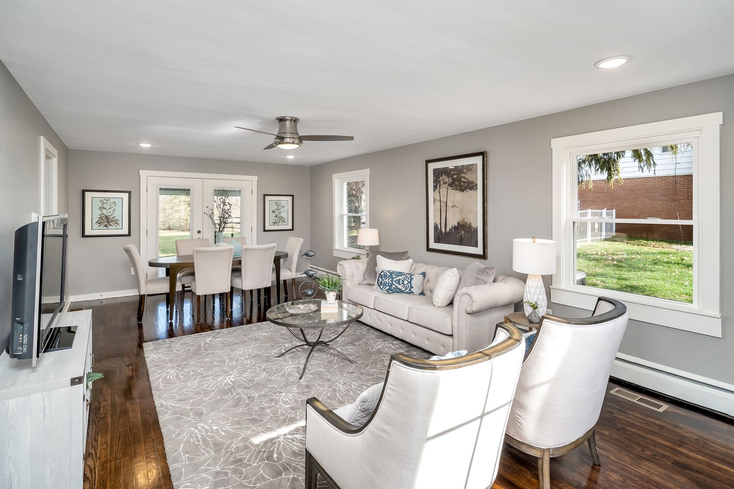Renovated colonial living and dining room with hardwood floors