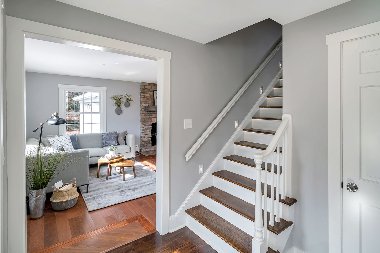 Rebuilt staircase opening to a renovated sitting room